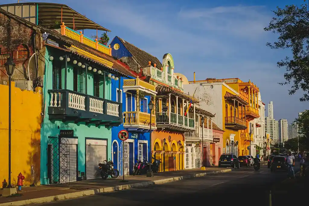 cartagena-houses-in-front-of-green-wall